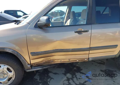 2002 Honda Cr-V Lx z USA, uszkodzony, nr VIN JHLRD78412C089853